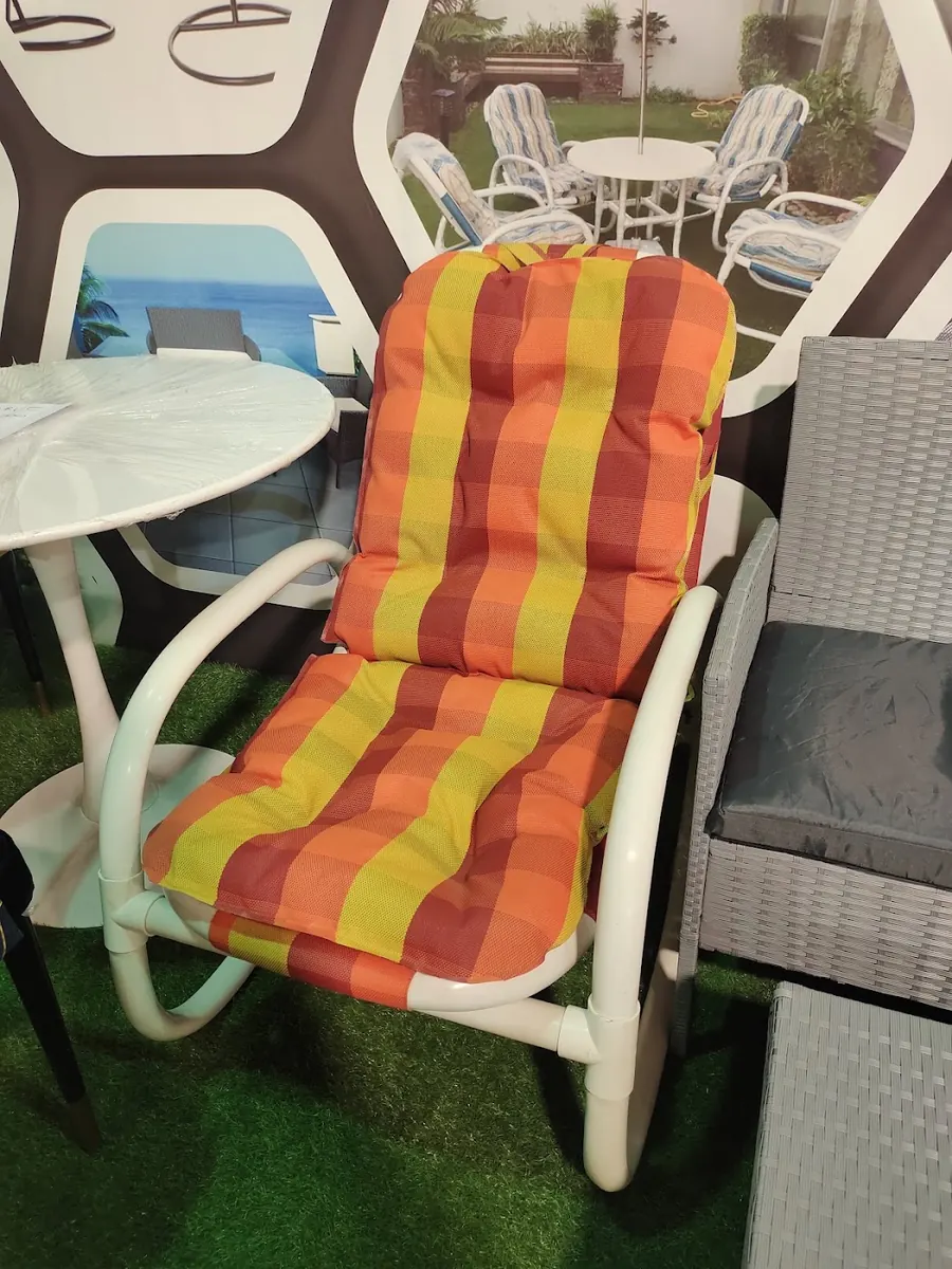 A striped-cushion outdoor armchair